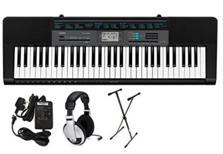 casio electric piano keyboard with stand and headphones