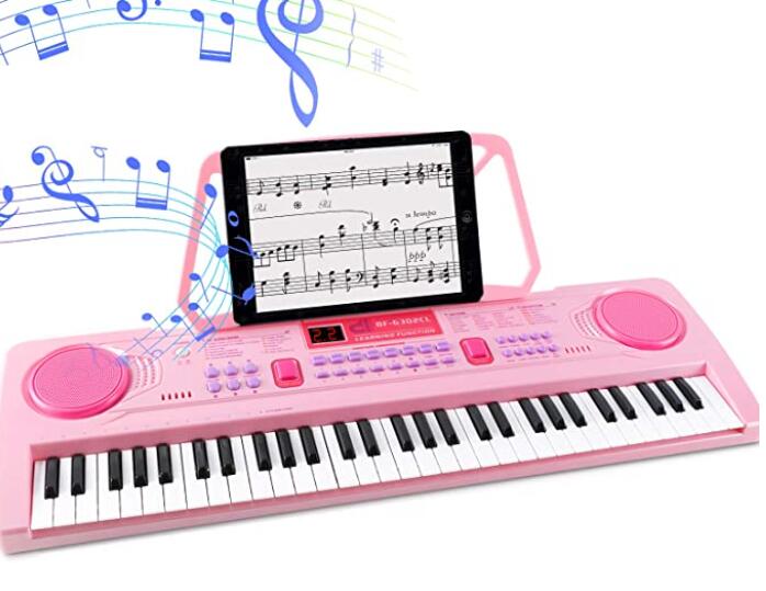 pink small electric keyboard piano for little girls